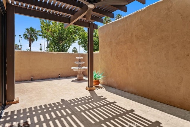 4881 S Winners Cir Unit A, Palm Springs, CA 92264 - view of patio featuring a pergola and a ceiling fan