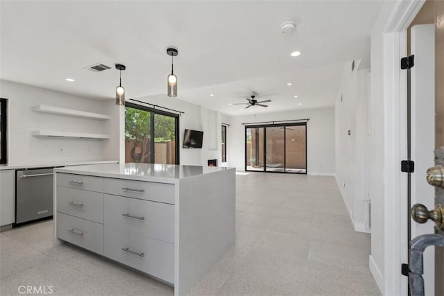 4881 S Winners Cir Unit A, Palm Springs, CA 92264 - kitchen with stainless steel dishwasher, gray cabinets, recessed lighting, modern cabinets, and a center island