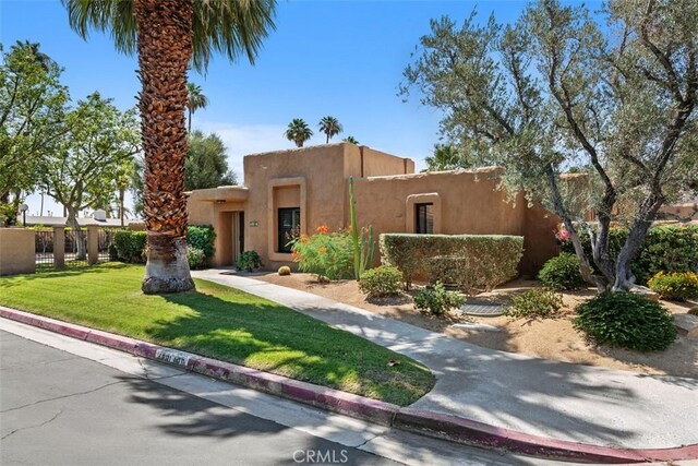 4881 S Winners Cir Unit A, Palm Springs, CA 92264 - view of adobe home