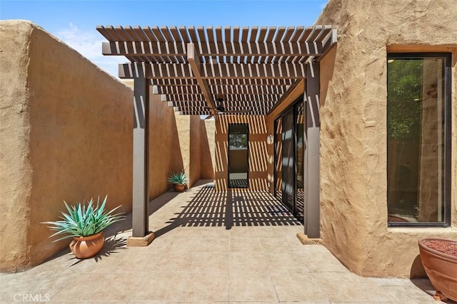 4881 S Winners Cir Unit A, Palm Springs, CA 92264 - view of patio with a pergola
