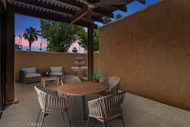 4881 S Winners Cir Unit A, Palm Springs, CA 92264 - view of patio / terrace featuring outdoor dining area, a pergola, and a ceiling fan