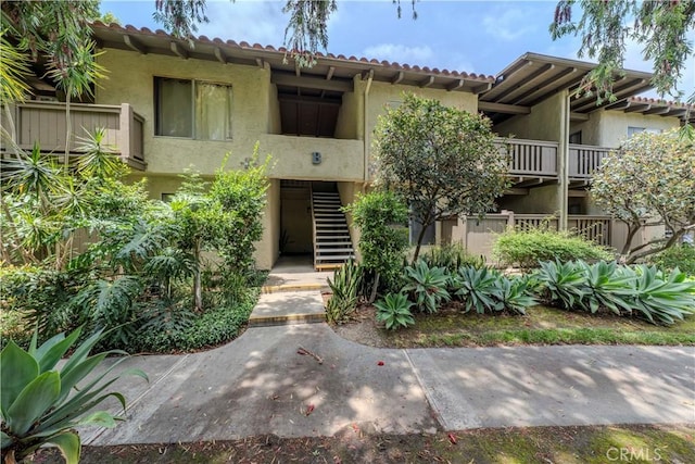 1345 Cabrillo Park Dr Unit B12, Santa Ana, CA 92701 - view of building exterior with stairs