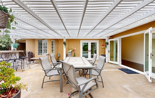 16671 Cedar Cir, Fountain Valley, CA 92708 - view of patio featuring a pergola, french doors, and outdoor dining space