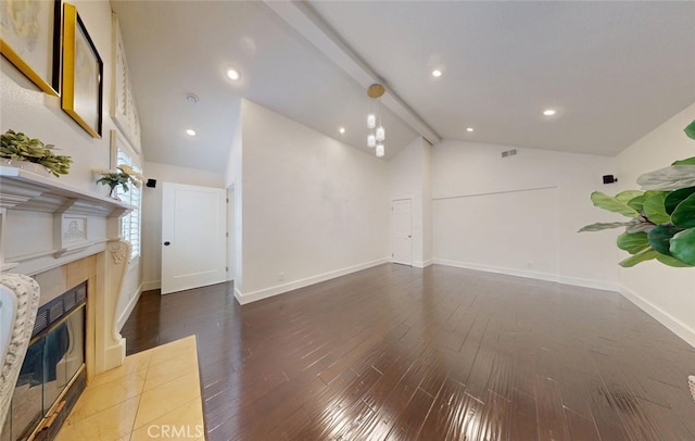 16671 Cedar Cir, Fountain Valley, CA 92708 - unfurnished living room with a tiled fireplace, dark wood-style flooring, and recessed lighting