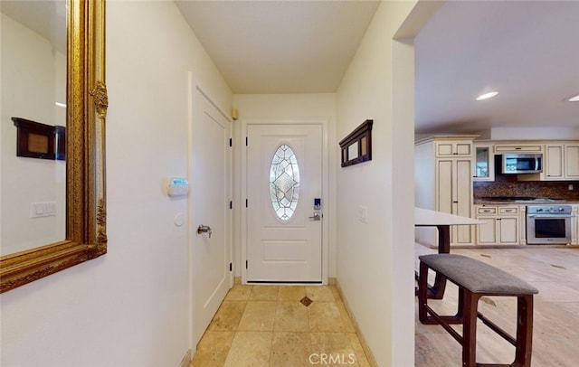 16671 Cedar Cir, Fountain Valley, CA 92708 - doorway to outside featuring baseboards