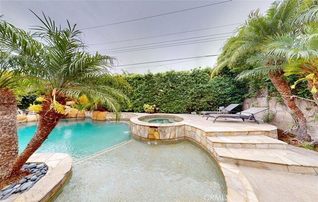 16671 Cedar Cir, Fountain Valley, CA 92708 - view of swimming pool with a patio and a pool with connected hot tub