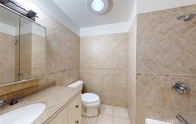 16671 Cedar Cir, Fountain Valley, CA 92708 - bathroom with vanity,  shower combination, tile walls, and tile patterned flooring