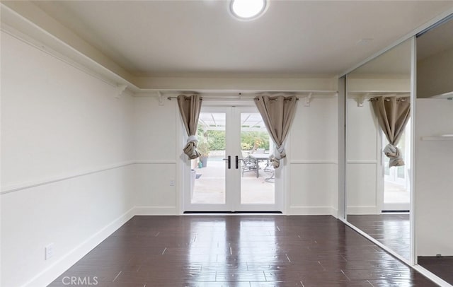 16671 Cedar Cir, Fountain Valley, CA 92708 - spare room featuring wood finished floors and french doors