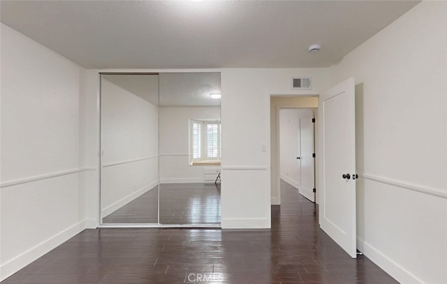 16671 Cedar Cir, Fountain Valley, CA 92708 - spare room with a smoke detector and wood finished floors