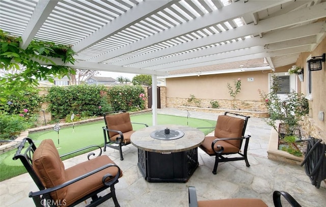 16671 Cedar Cir, Fountain Valley, CA 92708 - fenced backyard featuring a putting green, an outdoor fire pit, a patio, and a pergola