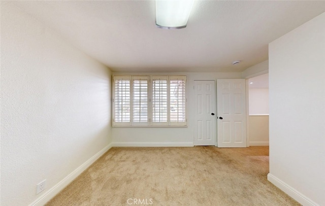 16671 Cedar Cir, Fountain Valley, CA 92708 - carpeted spare room with baseboards