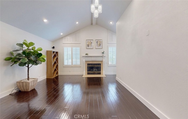 16671 Cedar Cir, Fountain Valley, CA 92708 - unfurnished living room featuring a chandelier, a fireplace with flush hearth, lofted ceiling, dark wood-type flooring, and recessed lighting