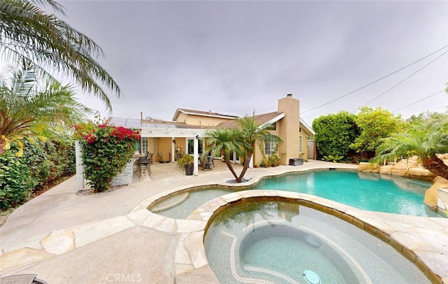 16671 Cedar Cir, Fountain Valley, CA 92708 - view of pool featuring a pergola, a patio, and a pool with connected hot tub
