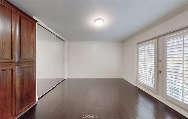 16671 Cedar Cir, Fountain Valley, CA 92708 - empty room with dark wood-style flooring, a textured ceiling, and ornamental molding