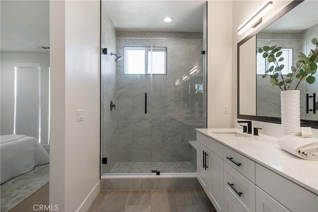 687 W 17th St, Costa Mesa, CA 92627 - bathroom featuring vanity, a shower stall, and recessed lighting