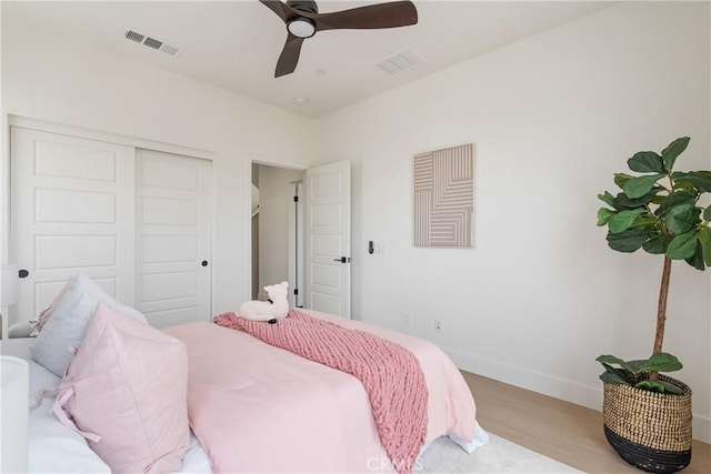 687 W 17th St, Costa Mesa, CA 92627 - bedroom with wood finished floors, a ceiling fan, and a closet