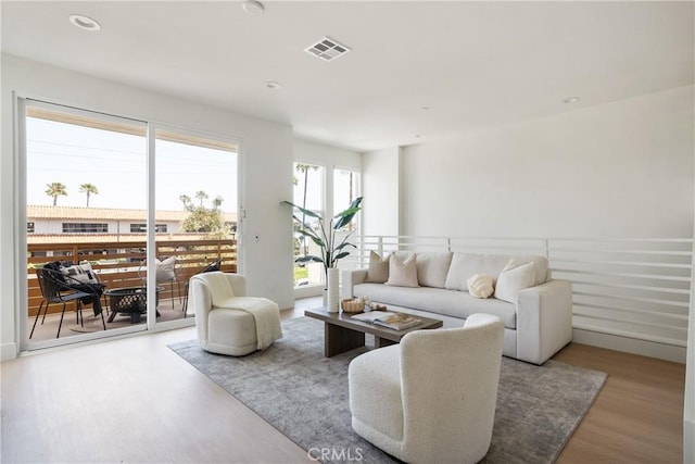 687 W 17th St, Costa Mesa, CA 92627 - living room with wood finished floors and recessed lighting