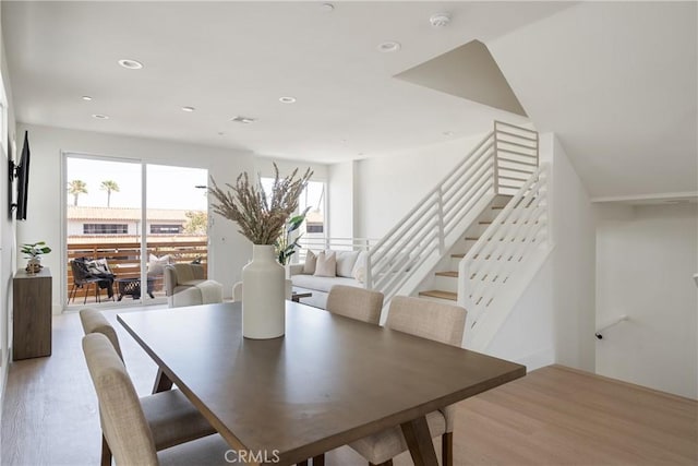 687 W 17th St, Costa Mesa, CA 92627 - dining area with light wood-style flooring, stairway, and recessed lighting