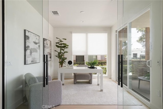 687 W 17th St, Costa Mesa, CA 92627 - office area featuring light wood-style floors and baseboards
