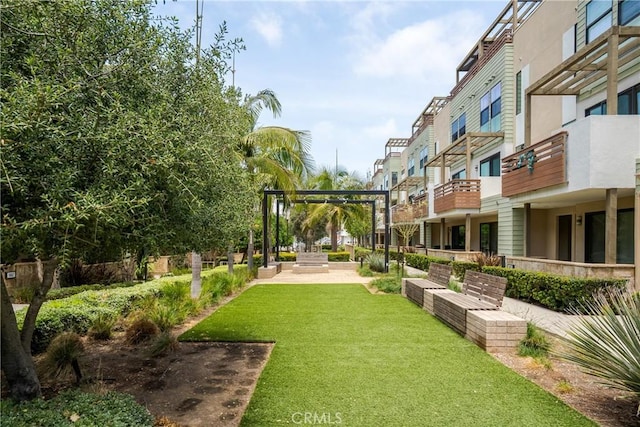 687 W 17th St, Costa Mesa, CA 92627 - view of property's community with a yard and a residential view