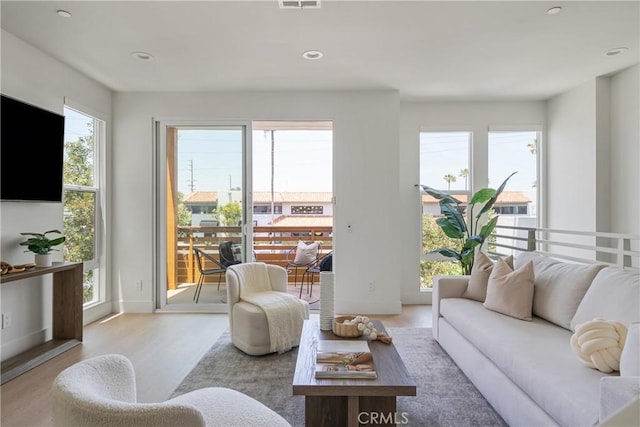 687 W 17th St, Costa Mesa, CA 92627 - living room featuring wood finished floors and recessed lighting
