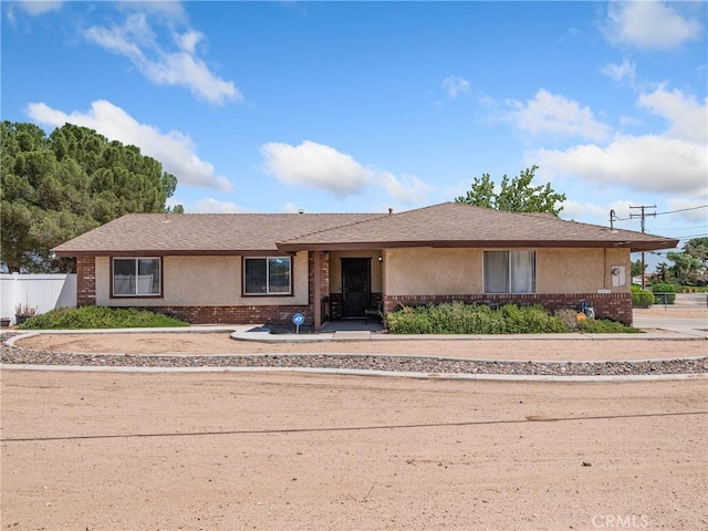 17702 Hinton St, Hesperia, CA 92345 - ranch-style home with brick siding, stucco siding, and a shingled roof