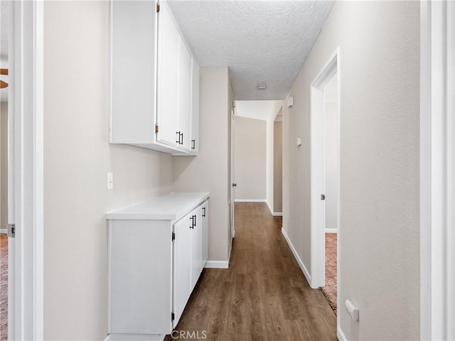 17702 Hinton St, Hesperia, CA 92345 - corridor featuring wood finished floors and a textured ceiling