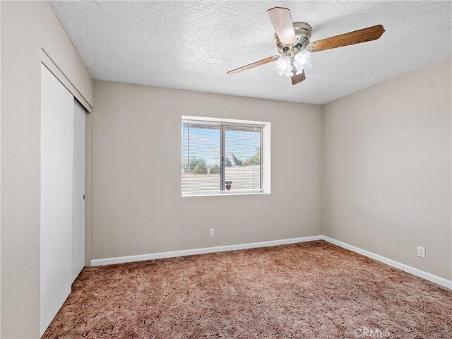 17702 Hinton St, Hesperia, CA 92345 - unfurnished bedroom featuring a closet, carpet flooring, a textured ceiling, and ceiling fan