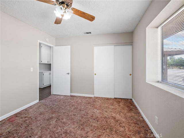 17702 Hinton St, Hesperia, CA 92345 - unfurnished bedroom with carpet, a closet, and a ceiling fan