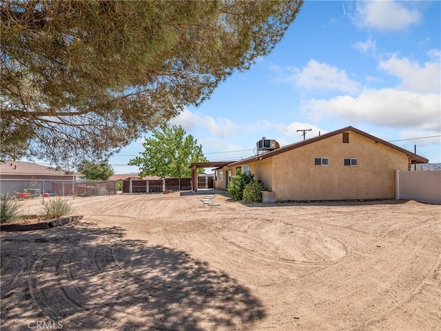17702 Hinton St, Hesperia, CA 92345 - rear view of property with stucco siding