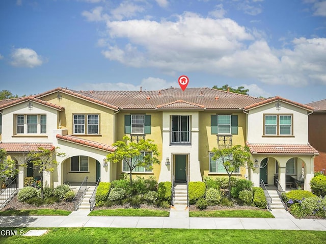 353 American River Ct, Oxnard, CA 93036 - view of front of house with covered porch, a tiled roof, and stucco siding