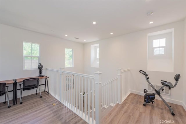 50 Tollson, Irvine, CA 92620 - workout area featuring wood finished floors and recessed lighting