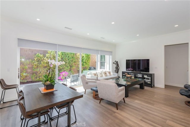 50 Tollson, Irvine, CA 92620 - living room featuring light wood-style flooring, recessed lighting, and crown molding