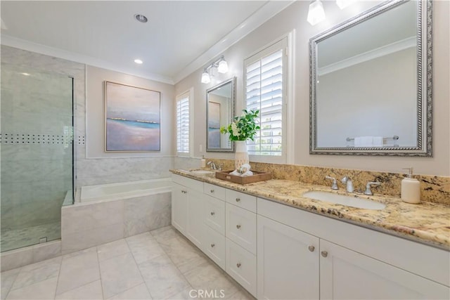 201 Bancroft, Irvine, CA 92620 - full bathroom featuring ornamental molding, a garden tub, double vanity, a shower stall, and recessed lighting