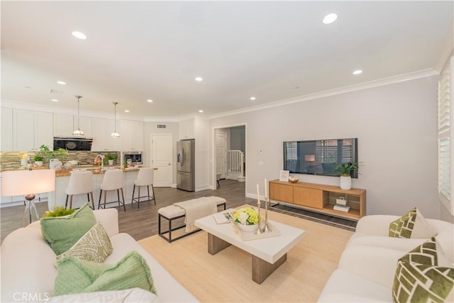 201 Bancroft, Irvine, CA 92620 - living area featuring recessed lighting, light wood finished floors, and crown molding