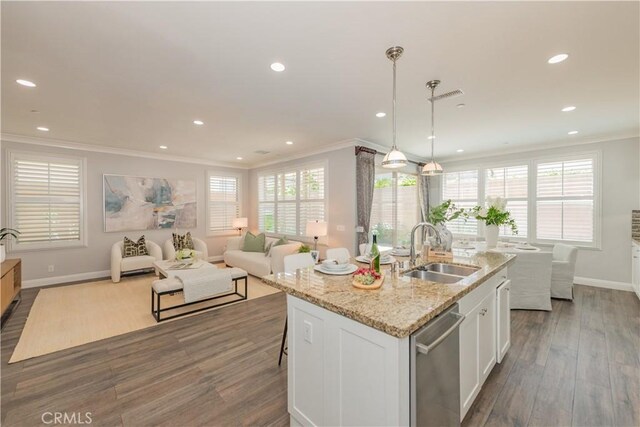 201 Bancroft, Irvine, CA 92620 - kitchen with dishwasher, ornamental molding, recessed lighting, dark wood-type flooring, and white cabinets