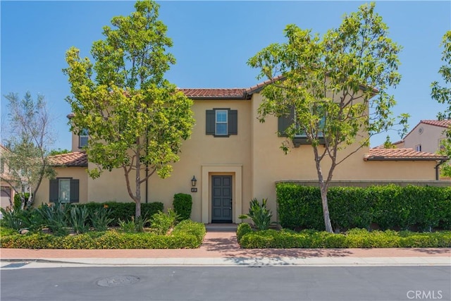201 Bancroft, Irvine, CA 92620 - mediterranean / spanish-style house with a tiled roof and stucco siding