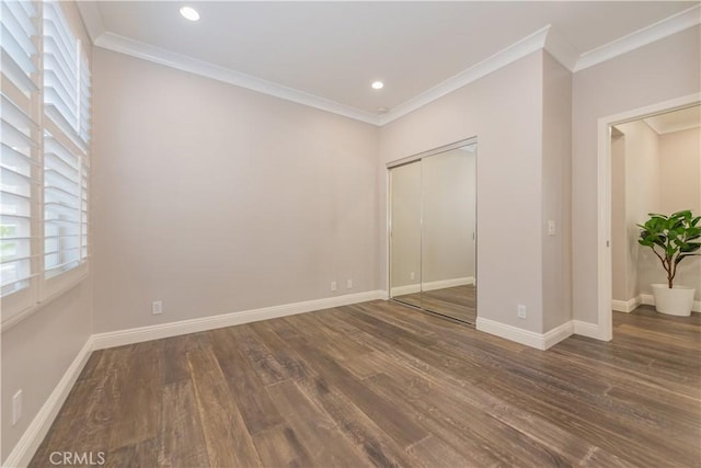 201 Bancroft, Irvine, CA 92620 - unfurnished bedroom with wood finished floors, multiple windows, ornamental molding, a closet, and recessed lighting