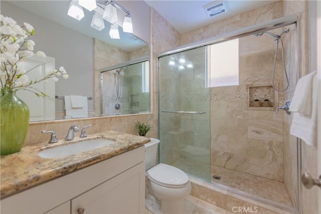 201 Bancroft, Irvine, CA 92620 - full bathroom with a shower stall, vanity, a skylight, and tile patterned floors