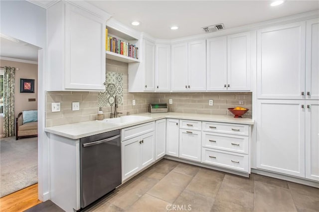 1107 Chestnut Ave, Redlands, CA 92373 - kitchen featuring dishwasher, ornamental molding, light countertops, white cabinetry, and decorative backsplash