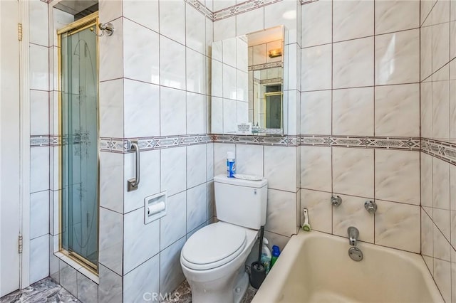 5437 Norwich Ave, Los Angeles, CA 90032 - bathroom featuring tiled shower, a bathtub, and tile walls
