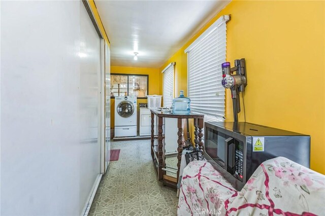 5437 Norwich Ave, Los Angeles, CA 90032 - laundry room featuring washing machine and dryer and baseboards