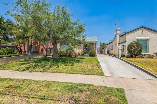 5437 Norwich Ave, Los Angeles, CA 90032 - view of front of home with concrete driveway and stucco siding