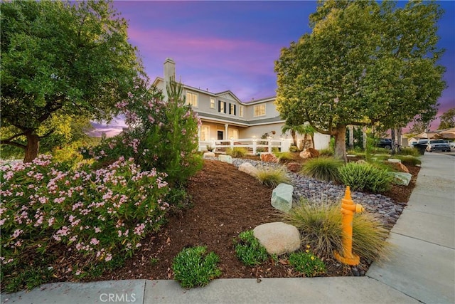 43611 Modena Dr, Temecula, CA 92592 - view of front of property featuring stucco siding and a chimney