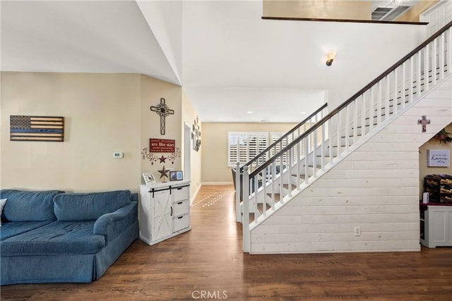43611 Modena Dr, Temecula, CA 92592 - stairway featuring wood finished floors
