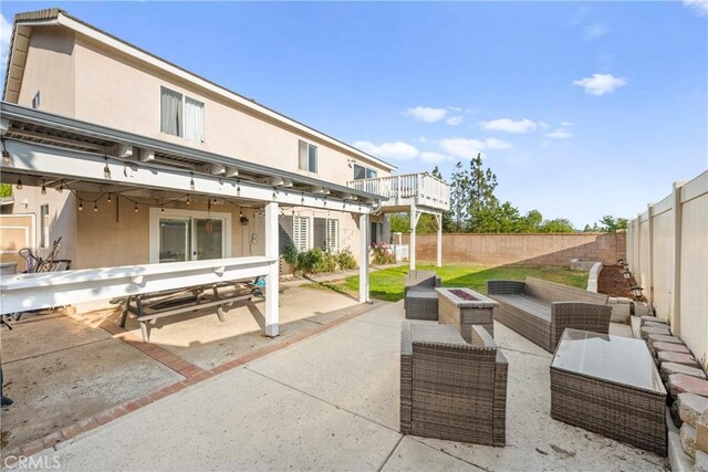 43611 Modena Dr, Temecula, CA 92592 - fenced backyard with a patio area and outdoor lounge area