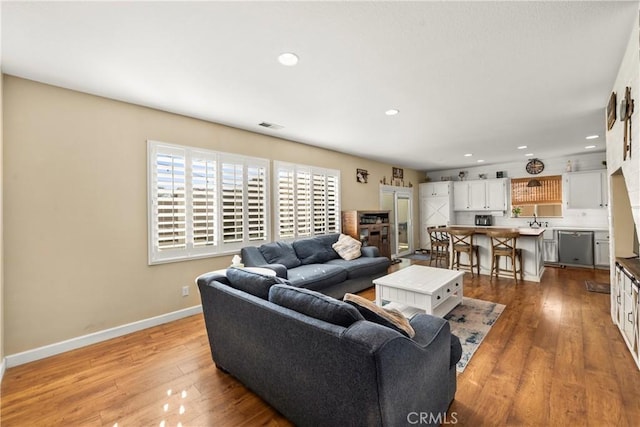 43611 Modena Dr, Temecula, CA 92592 - living area with light wood-type flooring and recessed lighting