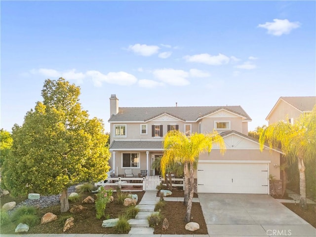 43611 Modena Dr, Temecula, CA 92592 - traditional home with covered porch, a chimney, concrete driveway, a garage, and a tile roof