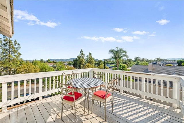 43611 Modena Dr, Temecula, CA 92592 - wooden terrace featuring outdoor dining area and a mountain view