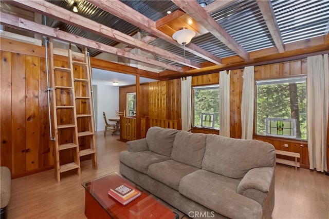 425 Blue Jay Canyon Rd, Blue Jay, CA 92317 - living area with wooden walls, light wood-style floors, and beam ceiling